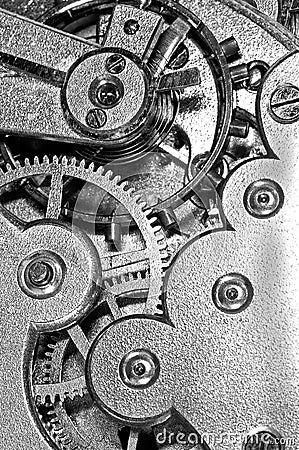 Gears and mainspring in the mechanism of a clock Stock Photo