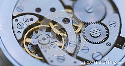 Gears And Mainspring In The Mechanism Of A Watch Stock Photo
