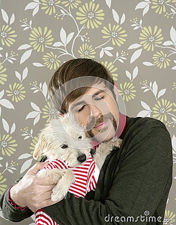 Geek retro man holding dog silly on wallpaper Stock Photo