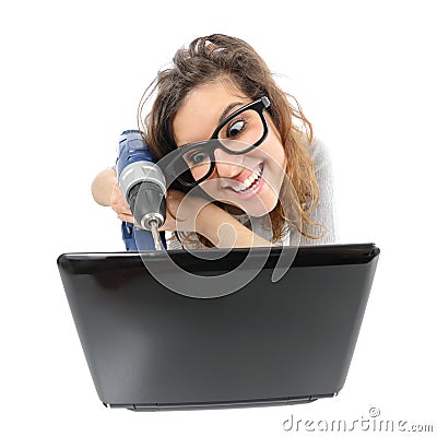 Geek woman repairing a laptop Stock Photo