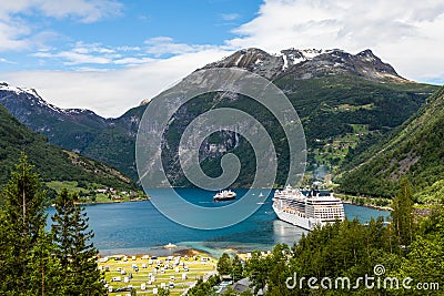 Geiranger fjord, harbor and fjord in More og Romsdal county in Norway famous for his beautiful boattrip through the fjord Editorial Stock Photo