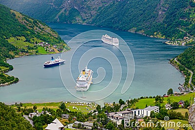 Geiranger, Norway â€“ July 09, 2013: ships moored in the marina Geiranger fjord Editorial Stock Photo