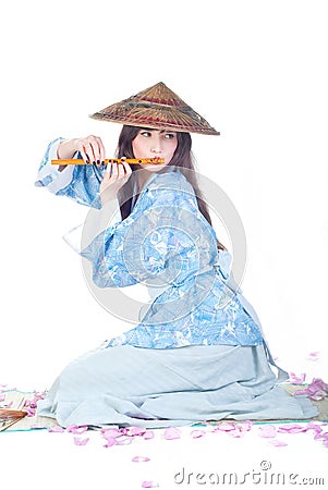 Geisha in blue kimono Stock Photo