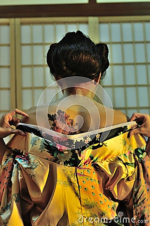 Geisha changing Stock Photo