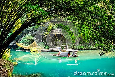 Geisha girl sitting on Chinese fishing boat Editorial Stock Photo