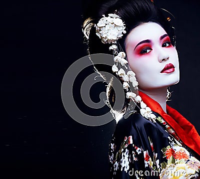 geisha in kimono on black Stock Photo