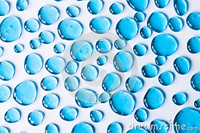 Gel blue drops forming a background. The concept of protection against viruses or cosmetics. Perfect gradient background for Stock Photo