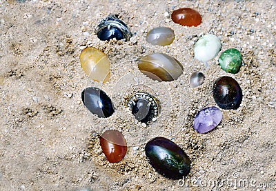 Gemstone burried at sand Stock Photo