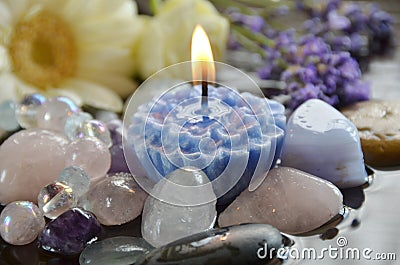 Gemstones and candle Stock Photo