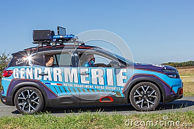 Gendarmerie patrol on a country road in escort during the tour de france cyclist Editorial Stock Photo