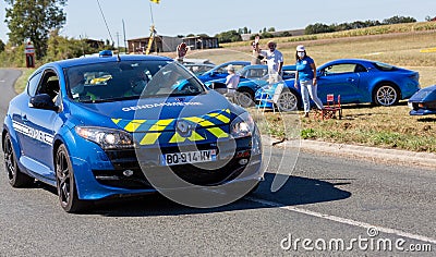 Gendarmerie patrol on a country road in escort during the tour de france cyclist Editorial Stock Photo