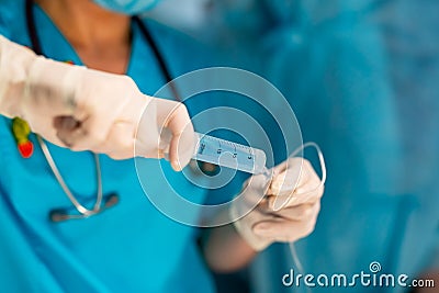 General anesthesia. Surgeons operating on patient in an operating theatre. Stock Photo