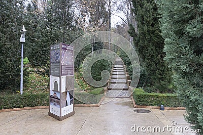 Generalife gardens informatic touristic signs with an antique stairways in sunny day Editorial Stock Photo