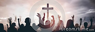 Christian people group raise hands up worship God Jesus Christ together on cross over cloudy sky background. Generative AI Stock Photo