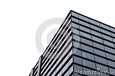 Generic corporate architecture modern building, contemporary office windows, low angle shot, simple minimal bright background Stock Photo