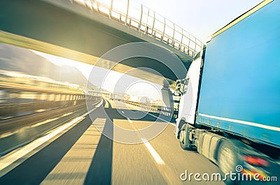 Generic semi truck speeding on highway - Logistic transport concept Stock Photo