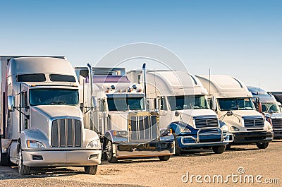 Generic semi Trucks at a parking lot Stock Photo