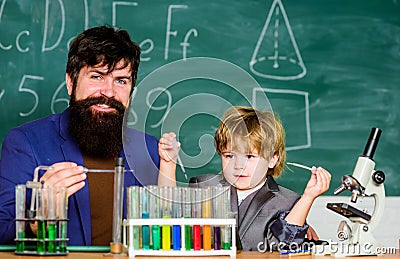 Genius kid. Achieving developmental milestones way before predicted sign that child ready to be challenged. Chemical Stock Photo