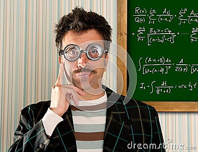Genius nerd glasses silly man board math formula Stock Photo