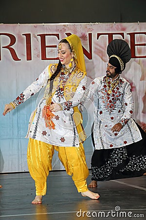Genoa Italy-09-03-2019: Bhangra dance at the festival of the Orient in Genoa. Editorial Stock Photo