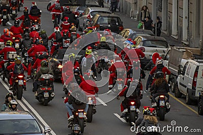 GENOA, ITALY - DECEMBER 23 2023 - The parade of Santas on motorcycles Editorial Stock Photo