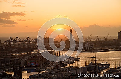 Aerial view of Genoa, Italy at sunset, the harbor with the Lanterna, the lighthouse, symbol of Editorial Stock Photo