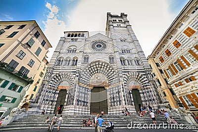 Genoa - The Saint Lawrence Cathedral with people relaxing on the stairs Editorial Stock Photo