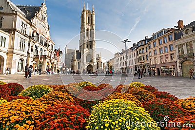 Gent, Belgium - 10 26 2019: Saint Bavo`s Cathedral Sint-Baafskathedraal a nice view of the main place with some people and some Editorial Stock Photo