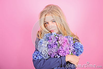 Gentle delicate flower. Pure beauty. Tenderness of young skin. Springtime bloom. Simple beauty. Girl cute blonde hug Stock Photo