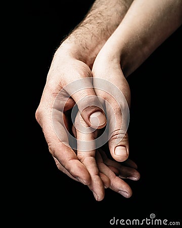 A gentle touch of two hands. Stock Photo