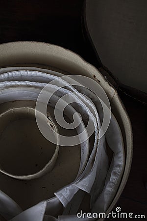 Gentleman's collars in a leather collar box on a dark wood table Stock Photo