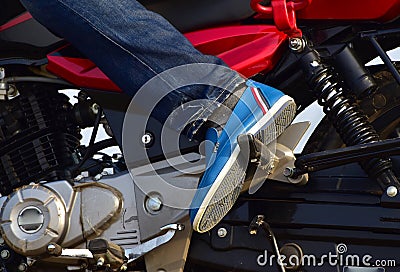 Gents footwear with the bike`s body photograph Stock Photo