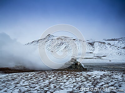 Geo-thermal vent releases mist and gas into the air in Iceland Stock Photo