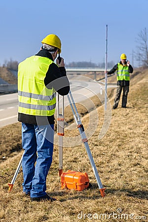 Geodesist measure land speak transmitter Stock Photo