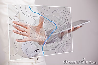 Geographic information systems concept, woman scientist working with futuristic GIS interface on a transparent screen. Stock Photo
