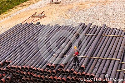 Geological exploration. Steel pipes (boring tube) for drilling the ground to a shallow depth Editorial Stock Photo