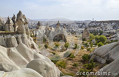 Geological mountain formations with dovecotes of the Pigeon valley in Goreme, Cappadocia, Turkey Stock Photo