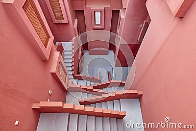 Geometric building construction. The red wall, La manzanera. Calpe Stock Photo