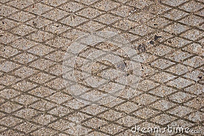 Geometric diamond shape pattern of concrete pavement Stock Photo