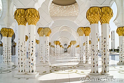 Columns and arabesques of Grand Mosque Abu Dhabi Stock Photo