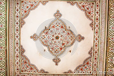 Geometric patterns on the ceiling of an old building in Indian style Stock Photo