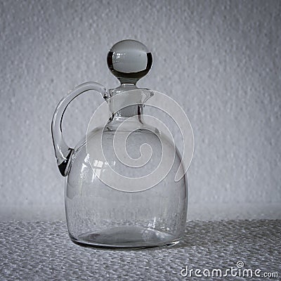 A geometric, rectangular patterned clear glass vase. Stock Photo