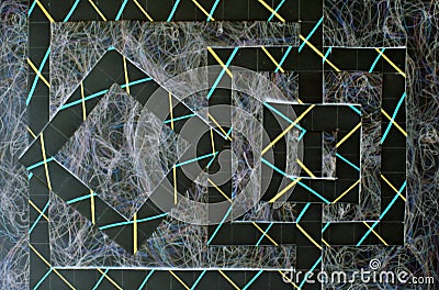 Geometric sketch. Striped squares on a dark background. Stock Photo