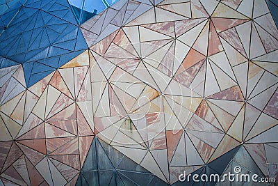 Geometric triangle pattern background on wall. Stock Photo