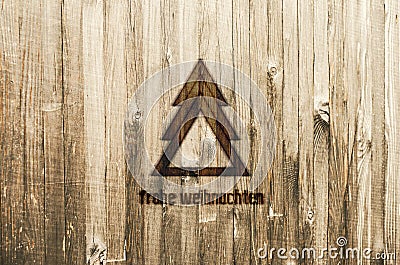 Geometrical Christmas Tree Burned in Wood. Christmas Card with text in German Frohe Weihnachten, in English Merry Christmas. Stock Photo