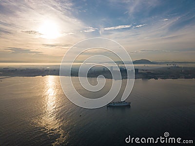 Aerial view ship sail at sea. Background is Seberang Perai. Editorial Stock Photo