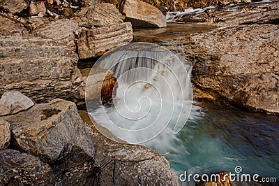 Georgous mountain river with a tiny waterfall among the rocks Stock Photo