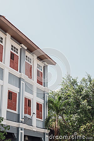 Georgetown street traditional malaysian house and green tree in Penang, Malaysia Stock Photo