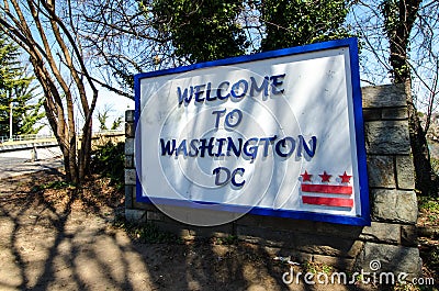 Georgetown, Washington DC: Sign welcomes visitors and residents to Washington DC on a sunny day Editorial Stock Photo