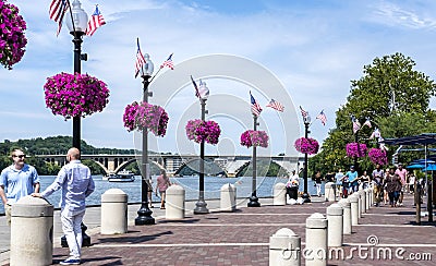 Georgetown Waterfront Boardwalk on a Sunday Afternoon Editorial Stock Photo